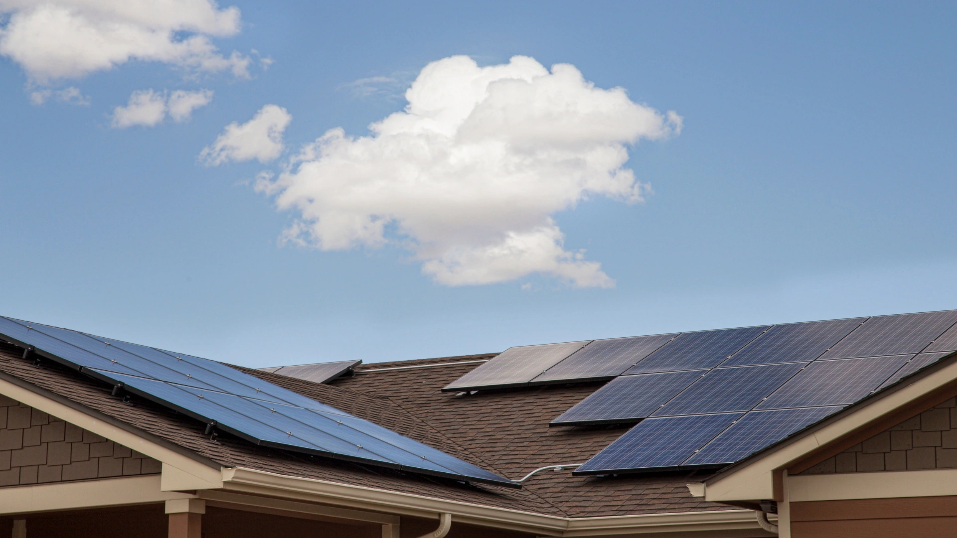 Solar battery storage Queensland home with rooftop solar panels